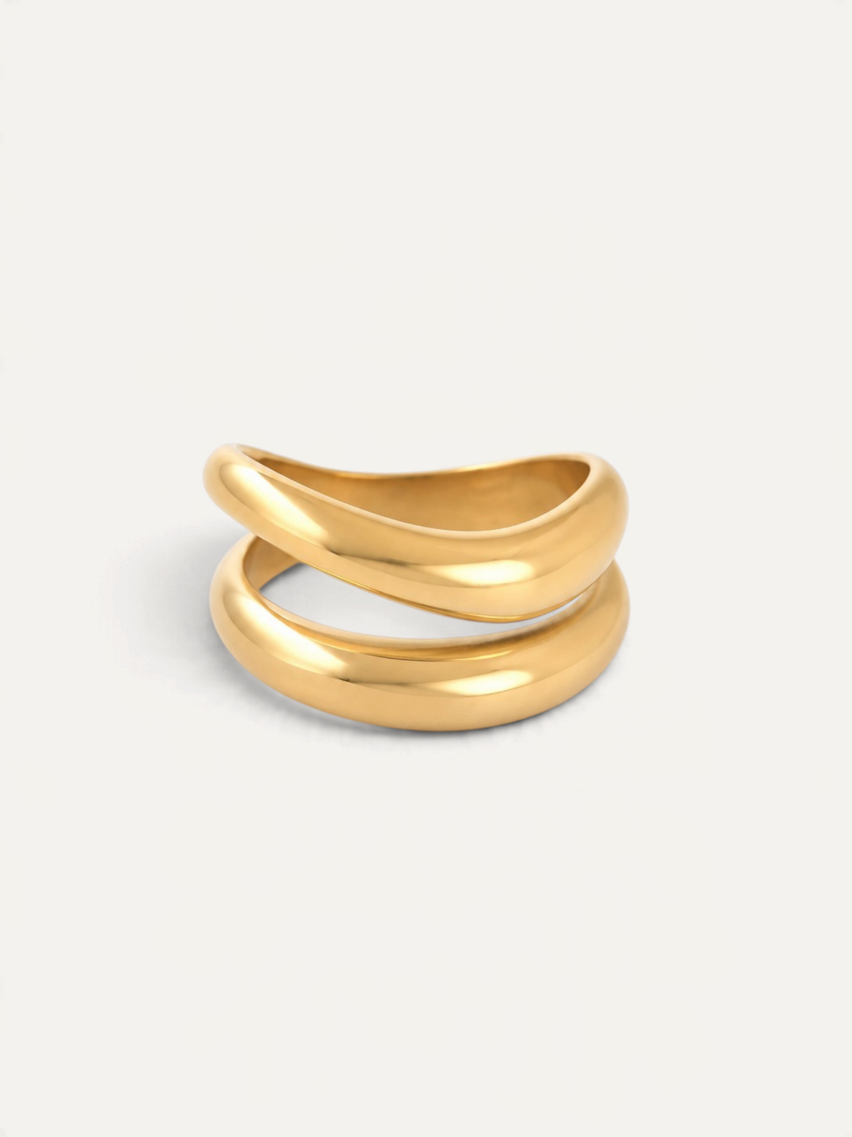 CÉLOIR Aurore Ring aus goldfarbenem Edelstahl mit modernem, geschwungenem Doppel-Design