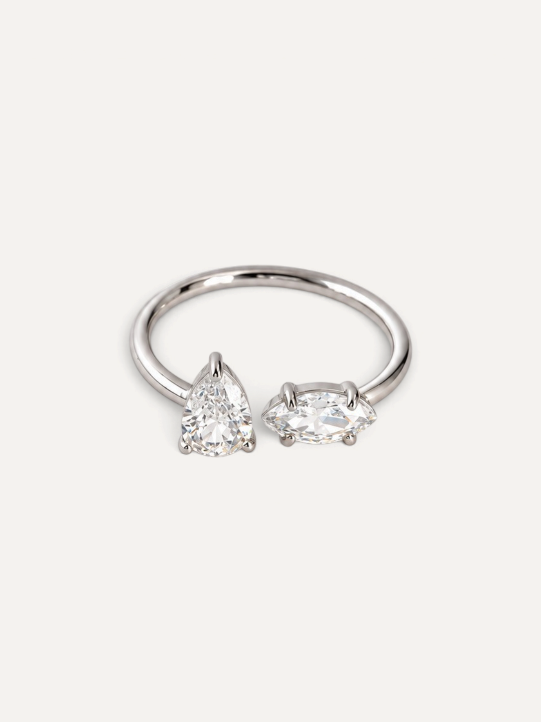 CÉLOIR Sira Ring aus silberfarbenem Edelstahl mit tropfenförmigem und marquiseförmigem Zirkonia-Stein